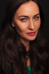 Naklejka premium portrait of a young woman with blue eyes