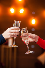 Celebration. People holding glasses of champagne making a toast