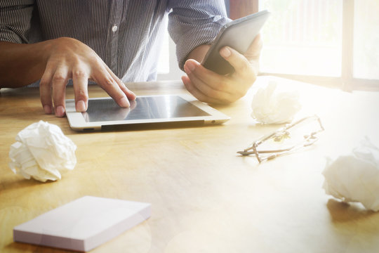 Men's hands touch the tablet screen.mobile payments online shopping customer network connection on screen. m-banking and omni channel concept