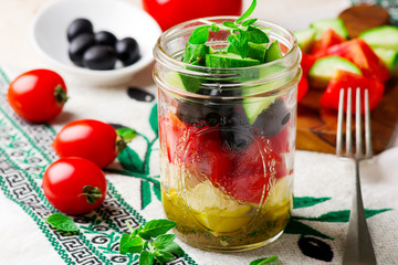  Greek salad  in  Mason jar. style rustic