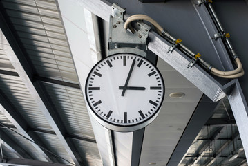 Timetable at the Central Station, Clock in the railway station. Clock Station and Close up of an analog clock.