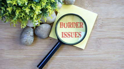 Ornamental trees, stones Small, magnifying glass, sticky note with text border issues