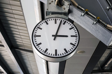 Timetable at the Central Station, Clock in the railway station. Clock Station and Close up of an analog clock.