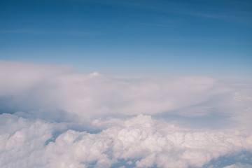 Above the sky in airplane.