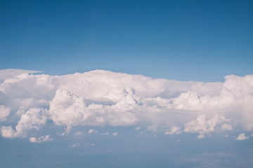 Above the sky in airplane.