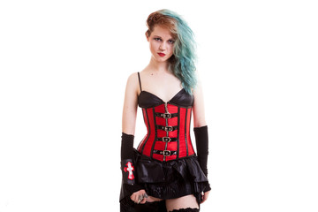 BDSM model in leather corset isolated on white background in studio photo