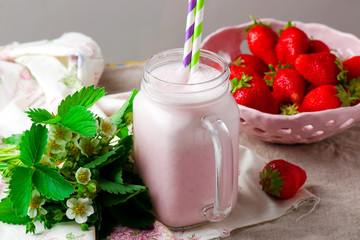 strawberry milkshake in mason jar.style vintage.