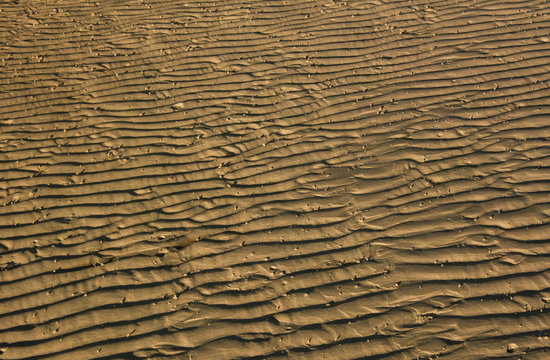 Sand wave background on the beach