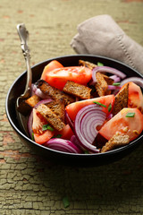 Vegan fresh tomatoes salad in bowl
