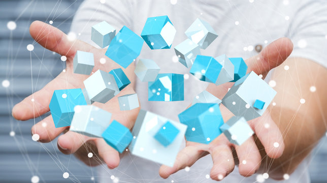 Businessman holding flying blue shiny cube 3D rendering