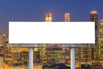 Blank billboard for advertisement in city downtown at night