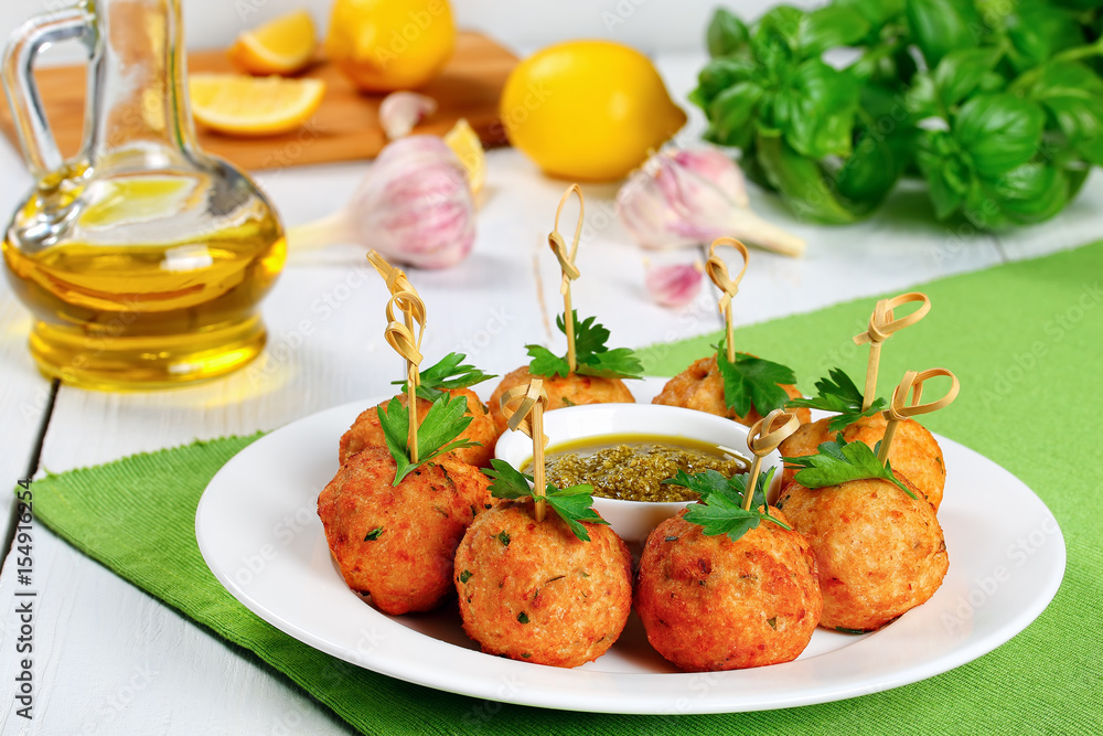 Canvas Prints delicious fried meatballs or italian polpette on wooden skewers on white plate with homemade sauce p