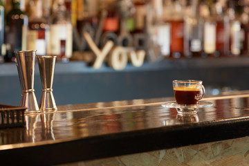 Cup of coffee on bar counter