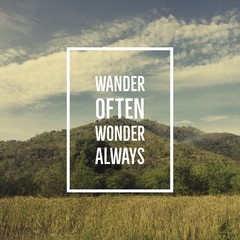 Inspirational motivational quote "wander often, wonder always" on mountain background.