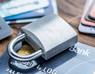 Credit cards and simle mechanical lock.