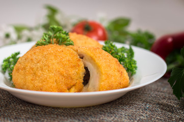 Chicken cutlets on Kiev. Old background. Top view. Close-up