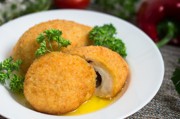 Chicken cutlets on Kiev. Old background. Top view. Close-up