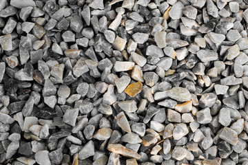 stone wall texture photo and white stones in the park,   stone background, stone floor texture.