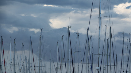Sailboat mast against a cloudy Sky