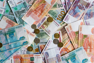 Many monetary denominations of different denominations and coins.