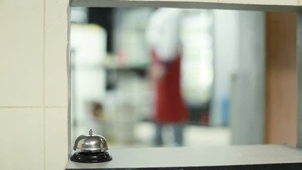Cook Man Pressing A Bell Indoor