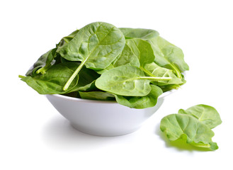Fresh bunch of spinach in the bowl.