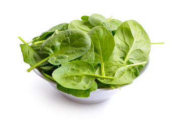 Fresh bunch of spinach in the bowl.