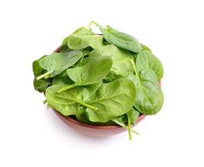 Fresh bunch of spinach in the bowl.
