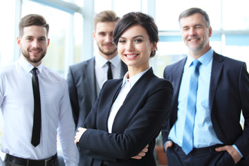 beautiful woman on the background of business people