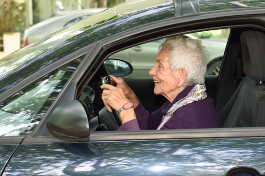 Senior Woman Driving A Car