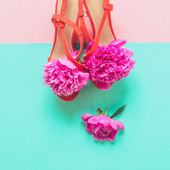 women sandals shoes with flowers in flat lay concept of spring and summer fashion