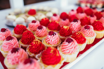 The buffet table with cakes