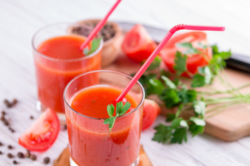 Tomato juice on white background