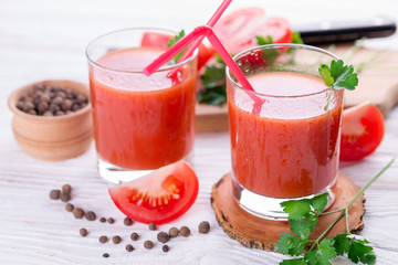 Tomato juice on white background