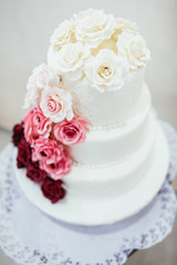 The wedding cake stands on the table
