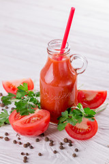 Tomato juice on white background
