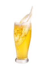 Naklejka na ściany i meble Beer splashing out of glass isolated on white background.