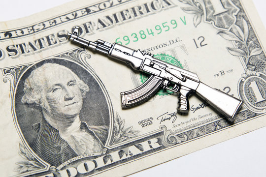Dollar and toy weapons