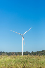 Wind turbine converts wind kinetic energy into electrical power. clean power