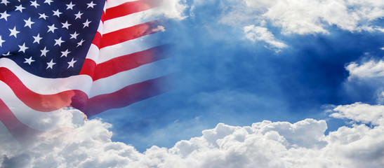 Fototapeta premium USA flag on cloud and blue sky background for 4 july independence day or other celebration
