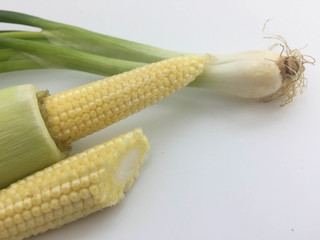 Ingredient background with babycorn and spring onion