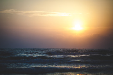 Beautiful sunset over the ocean. Sunrise in the sea.