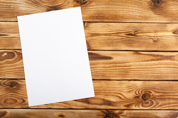Blank paper on wood table