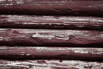 Old wooden beams with peeled color