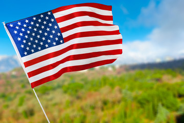 American flag against blue sky