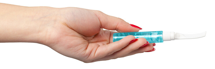 woman hand holding eyelash brush