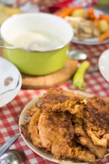Served lunch on the table with dill sauce and panned steaks.