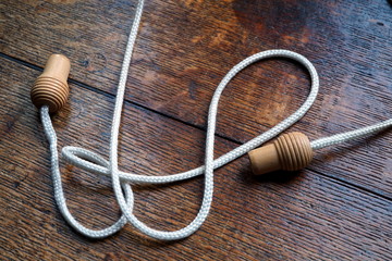 Wooden knobs or handles on a curtain pull cord