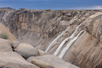 The Augrabies falls during flood-time along the  Orange river canyon at the Augrabies Falls...