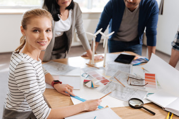 Pleasant female engineer enjoying her job